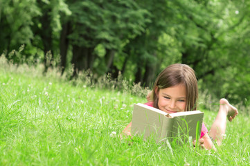 Girl reading Book in the Park