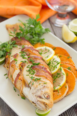 Fish (trout) baked with pumpkin and vegetables.