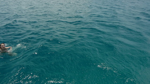 woman survivor almost drowning in the middle of the sea being re