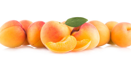 ripe apricots isolated on white background