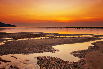 Tropical beach at sunset.