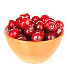 Cherry berries in bowl isolated on white