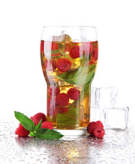 Iced tea with raspberries and mint isolated on white