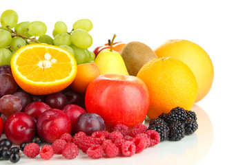 Fresh fruits and berries isolated on white
