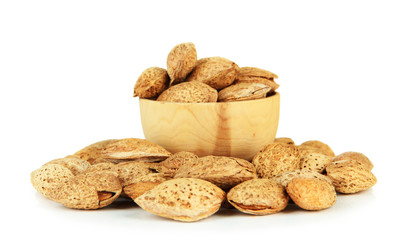 Almond in wooden bowl, isolated on white
