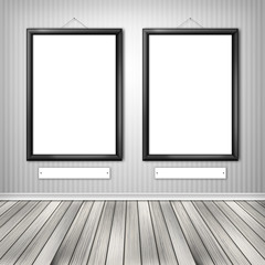 Two empty frames on a wall