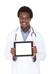 Male Doctor Using Digital Tablet