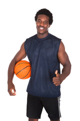 Obraz premium Basketball Player With Thumb Up Sign