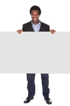 African Businessman With Placard