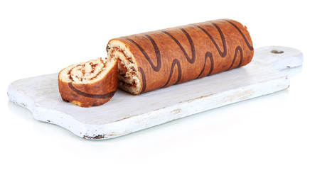 Sweet roll on cutting board isolated on white