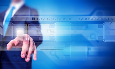 Businessman touching icon