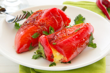 Roasted peppers stuffed with feta cheese, selective focus.