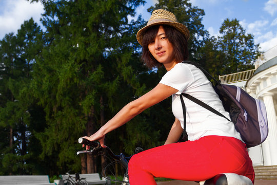 Hipster girl on a bicycle