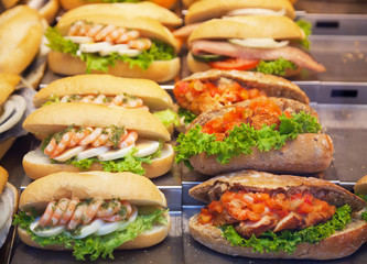 Various sandwiches on a shop counter
