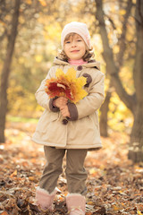 Child in autumn park