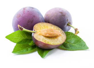 Plums and a half with leaves