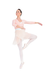 Smiling attractive ballerina spinning