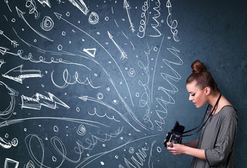 Photographer shooting images while energetic hand drawn lines an