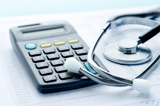 Stethoscope and calculator symbol for health care costs