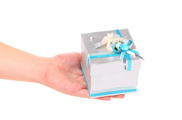 silver gift box with blue ribbon