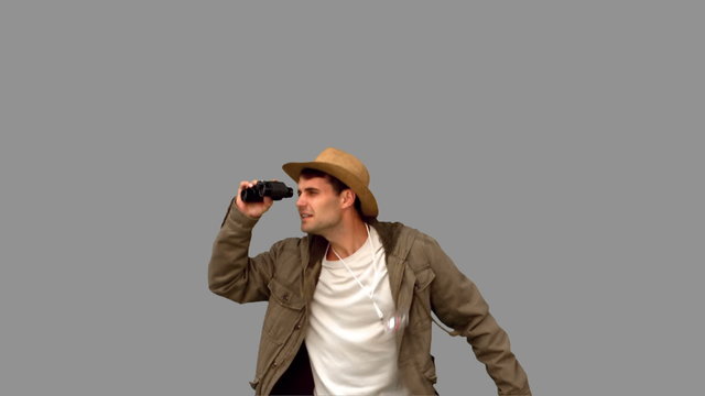 Handsome man orienteering on grey screen