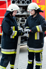 Fototapeta premium Female Firefighter Feuerwehrfrau