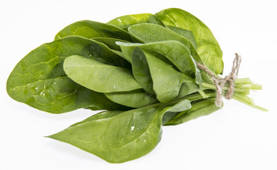 Fresh Spinach Leaves on white