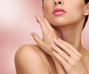 Obraz na płótnie Canvas Beauty woman hands with health skin on pink background