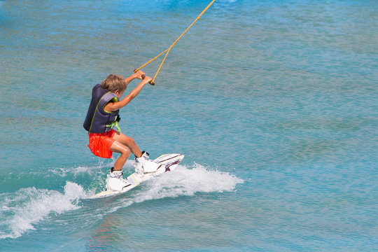 Young Child Boy Wake Boarding