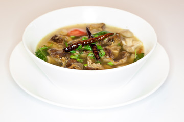 Thai style spicy pork soup