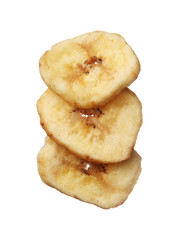 Dried banana chips isolated on white background