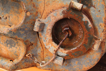 Old rusty metallic cap of jerry can