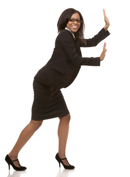 Business Woman Pushing Invisible Object