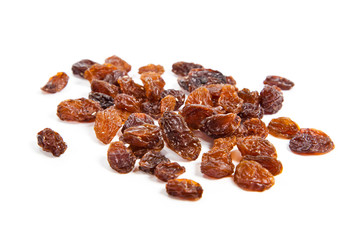 brown raisins on a white background