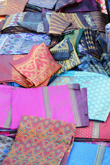 Assortment of colorful sarongs for sale