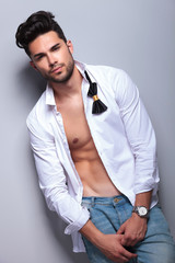 attractive young man looks at you