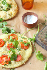 Spanish focaccia with tomatoes and herbs
