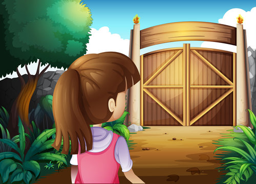 A young girl with a pink shirt going to the gate