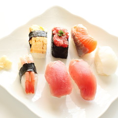 Japanese cuisine, assorted sushi on white dish