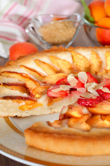 Apricot tart decorated with almond