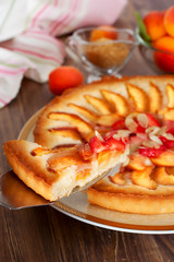 Apricot tart decorated with almond