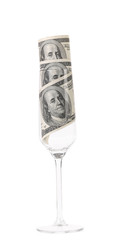 Champagne glass with money.