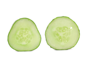 Fresh slices of cucumber on white background