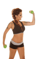 Woman tattoos fitness flex one arm