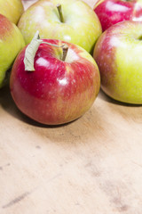 apples on a wooden background