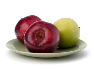 Apples pile on plate