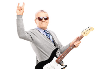 Cool middle aged man with an electric guitar