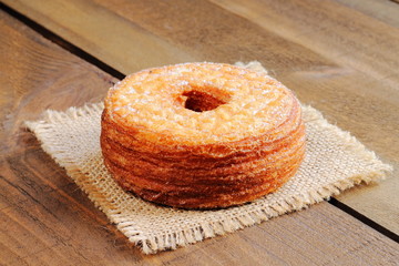 Fashionable puff pastry, half croissant and half donut