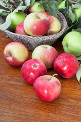 Naklejka na ściany i meble fresh summer apples on wooden table