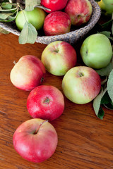 fresh summer apples on wooden table